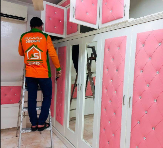 Al Salama Movers staff assembling furniture